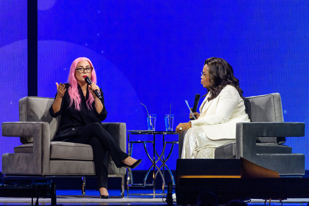 SUNRISE, FL - JANUARY 04: (EXCLUSIVE COVERAGE) Lady Gaga and Oprah Winfrey speak during the WW (Weight Watchers Reimagined) & Oprah's 2020 Vision: Your Life In Focus Tour at BB&T Center on January 4, 2020 in Sunrise, Florida.  (Photo by Jason Koerner/Getty Images for Oprah)